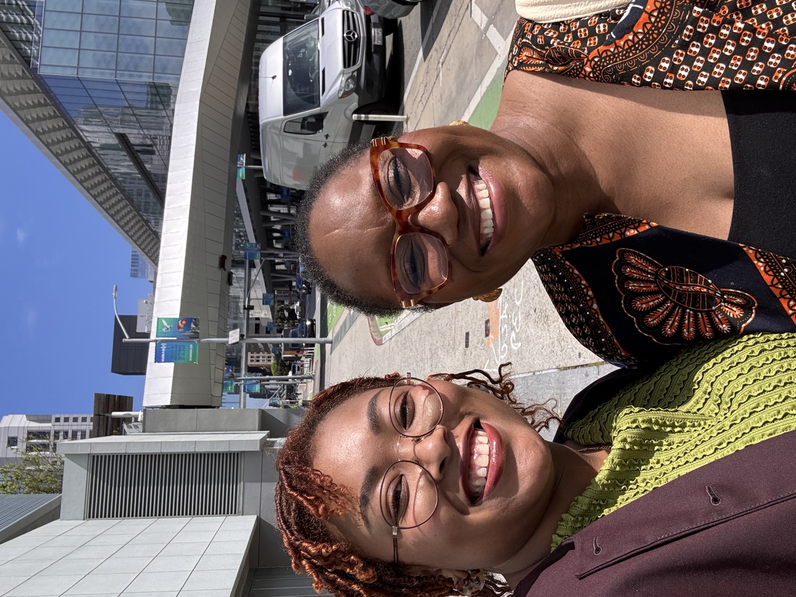 Leanna and colleague outside HumanX venue in San Francisco