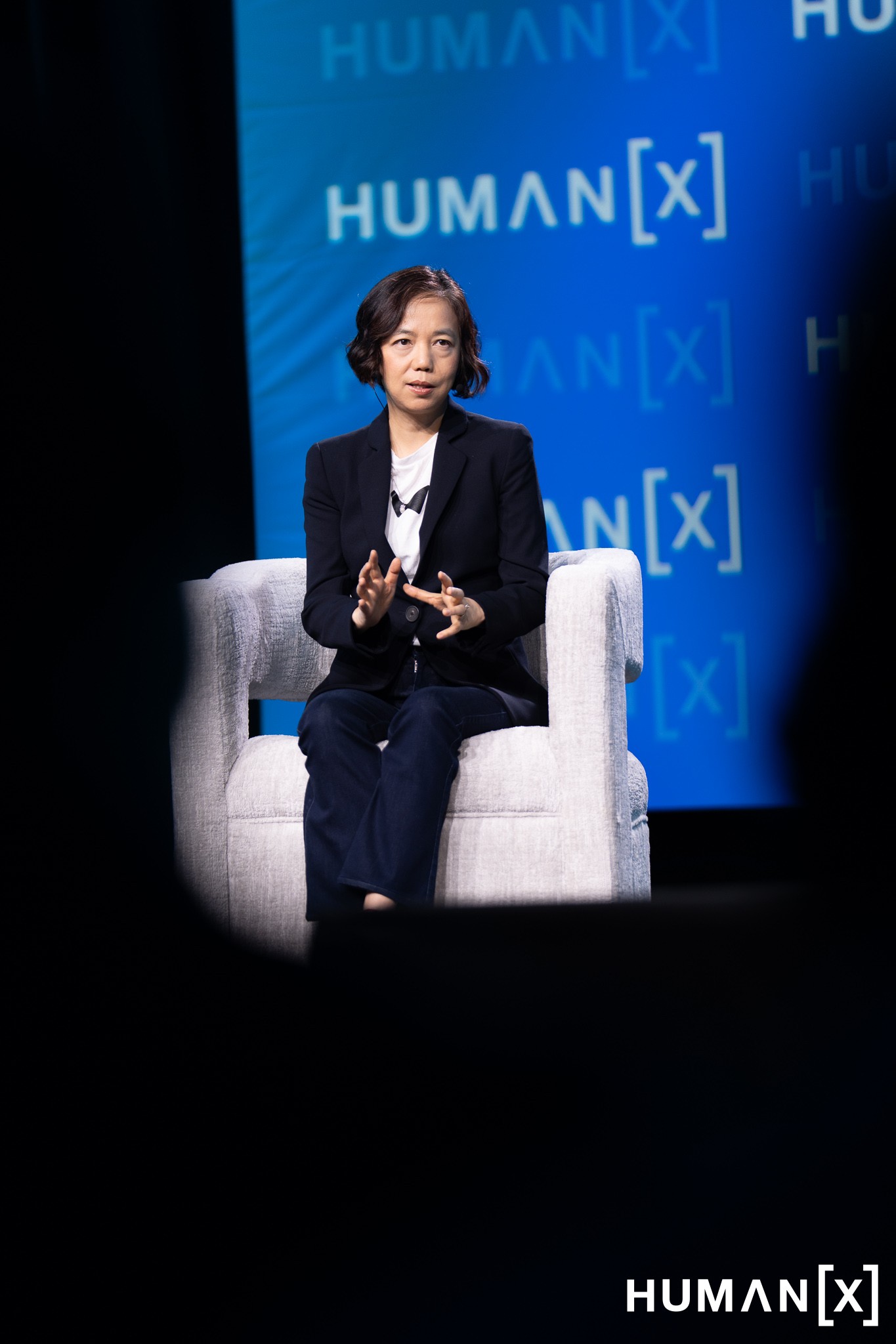 Dr. Fei-Fei Li on stage at HumanX 2026